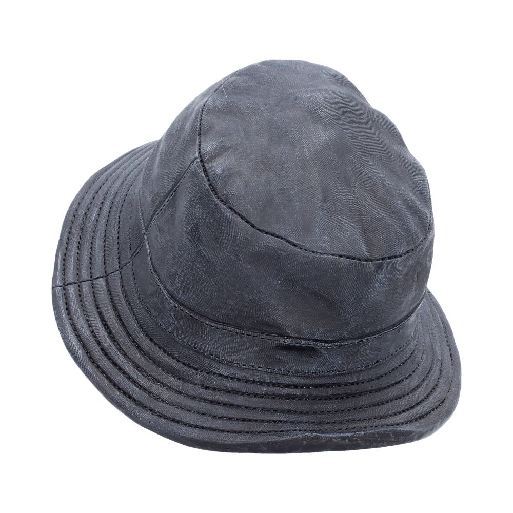 Back view of Mad For It skull figurine showing bucket hat detail