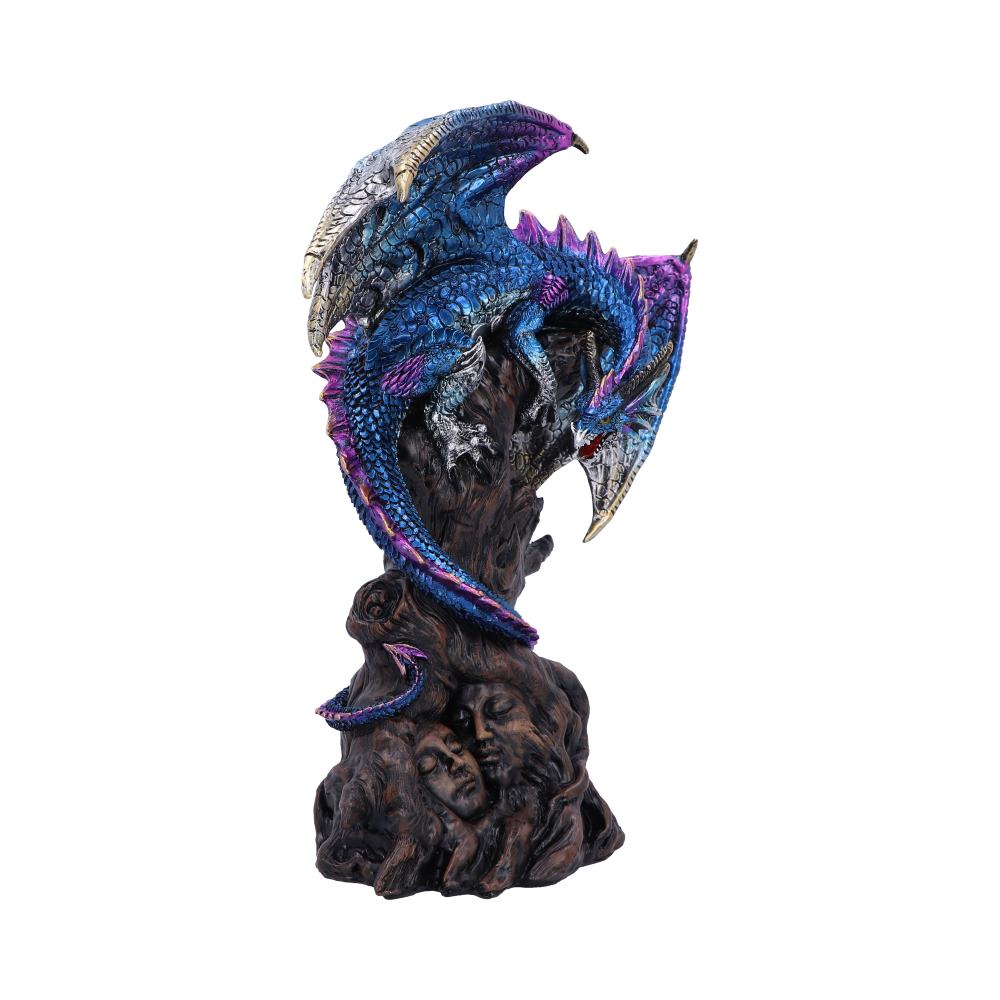 Dragon perched on tree trunk