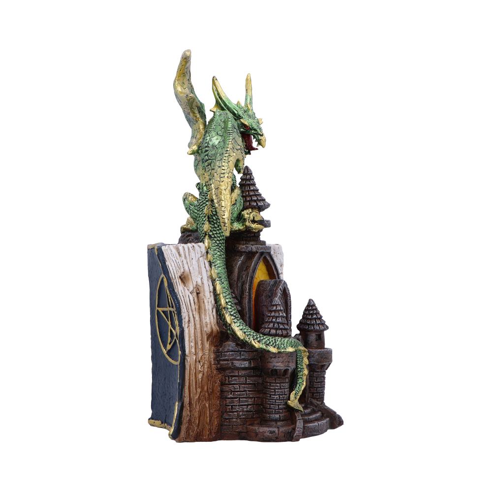 Rear view of the Draconis Arcanum Figurine showing the dragon's detailed wings, castle ruins, and hand-painted resin finish.