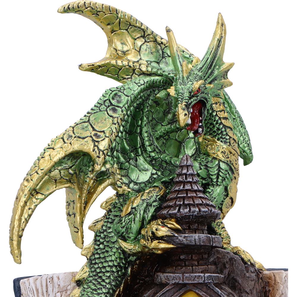 Dragon perched on ancient castle ruins