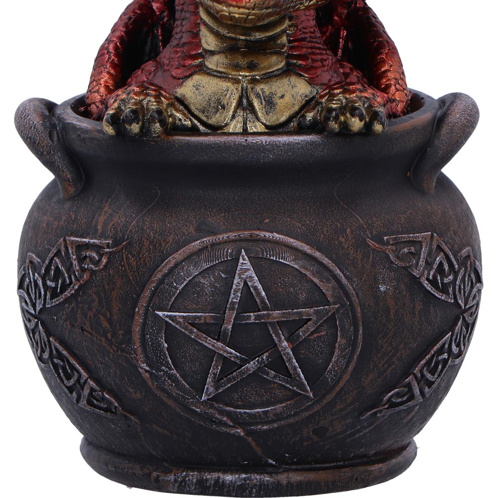 Gothic dragon ornament on a  cauldron with pentagram design