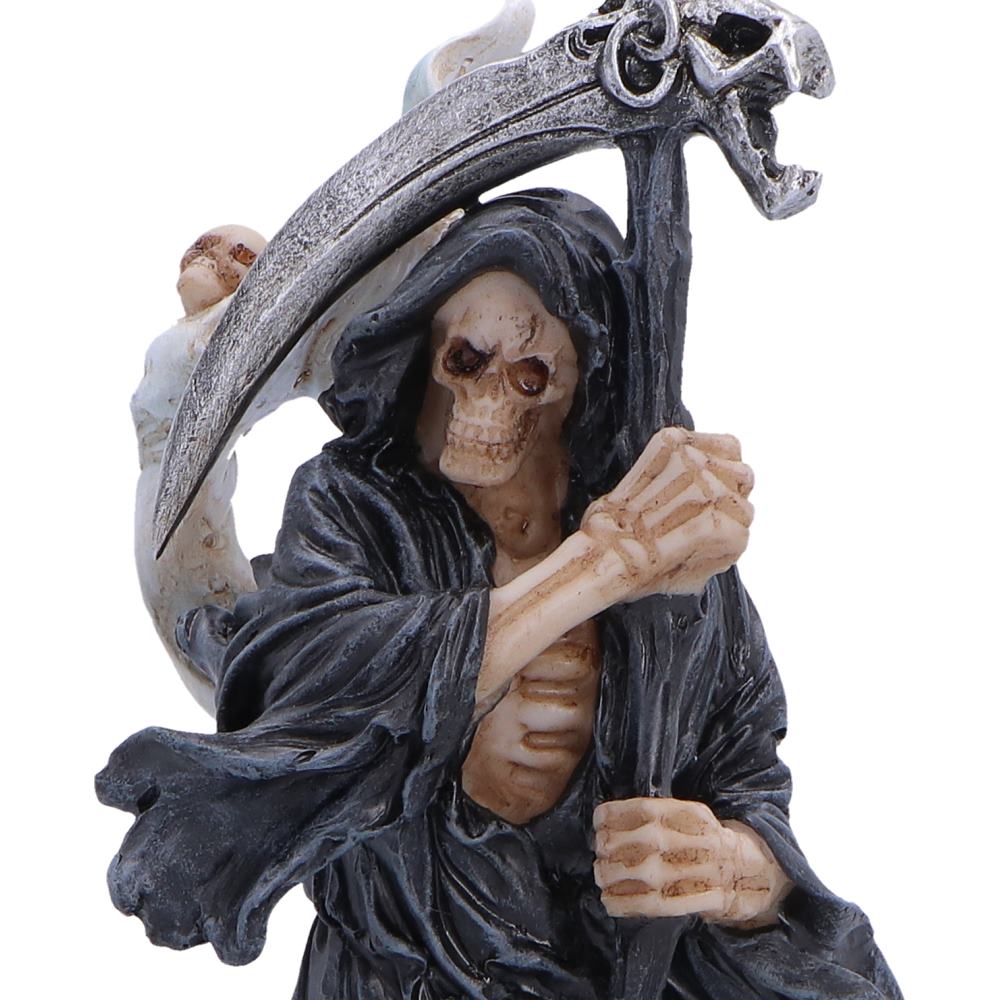 Close-up of reaper figure and scythe detail