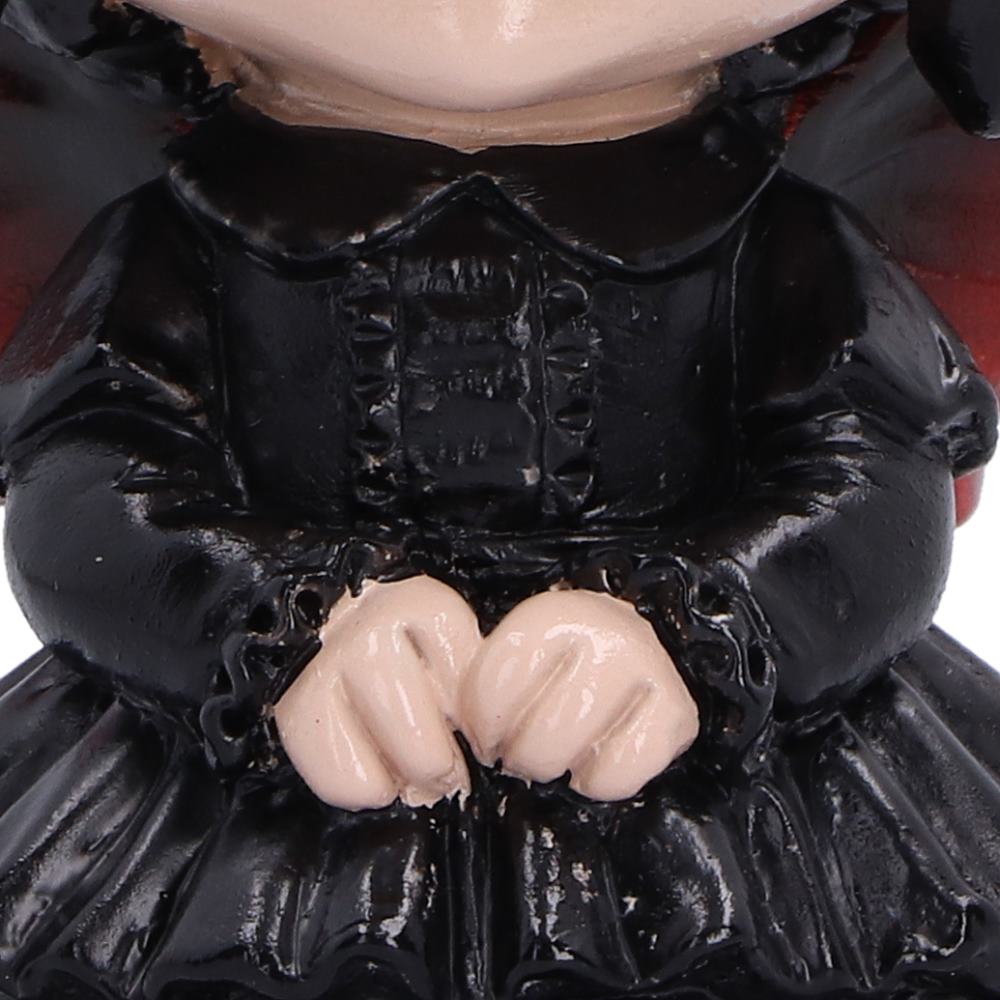 Close-up of Spirit Fairy Mortina bold black gothic design wearing a glossy black dress with pale skin-toned hands and lower face