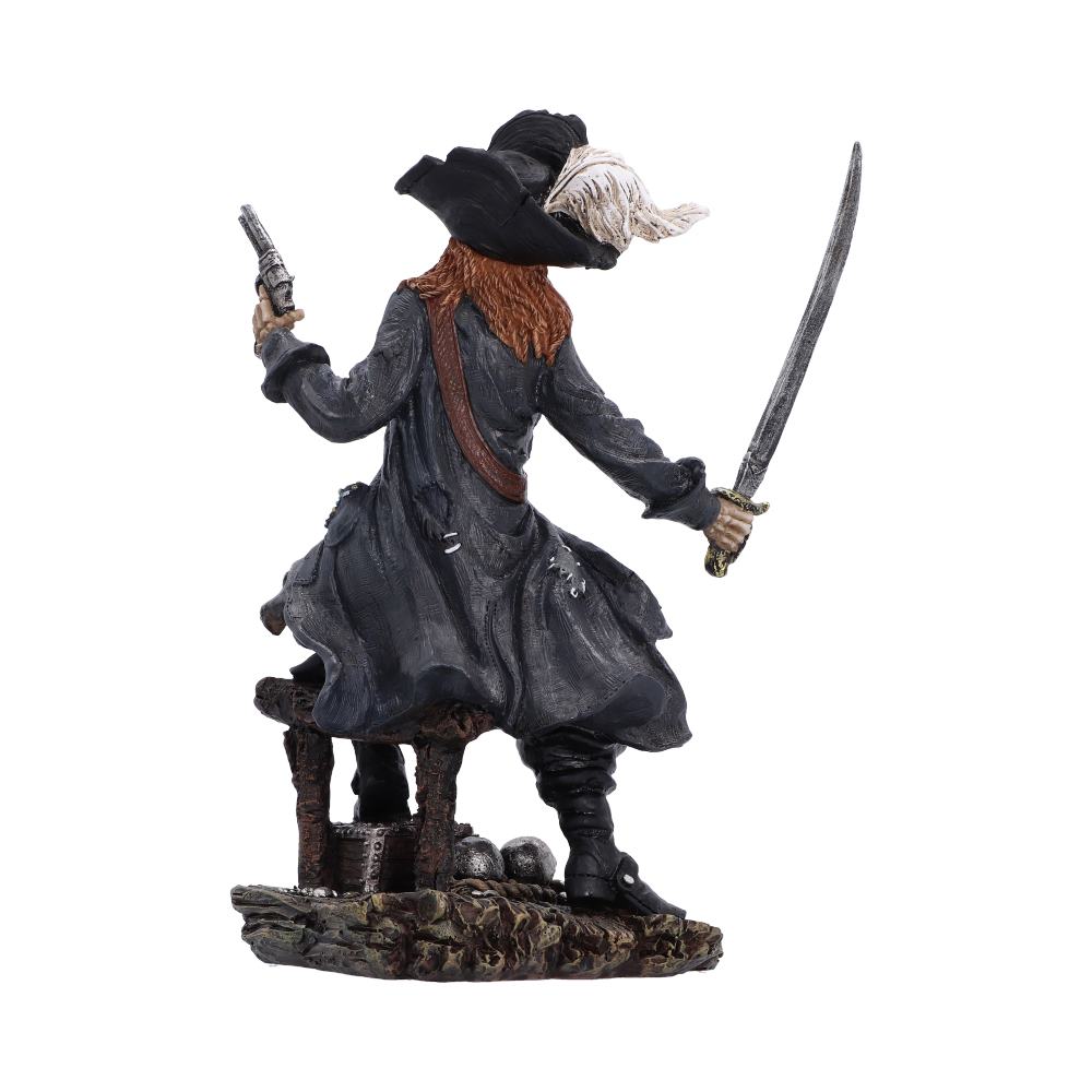 A pirate figurine shown from the back, wearing a black coat and hat with a white feather, holding a sword in one hand and a pistol in the other, standing on a rocky base