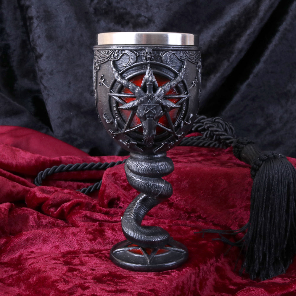A black goblet featuring a detailed Baphomet head design with a red patina around the cup, and a triple-horned goat with a pentagram on its head. The goblet has a twisted horn stem and is set on a base that also has the name 'Baphomet' inscribed on display